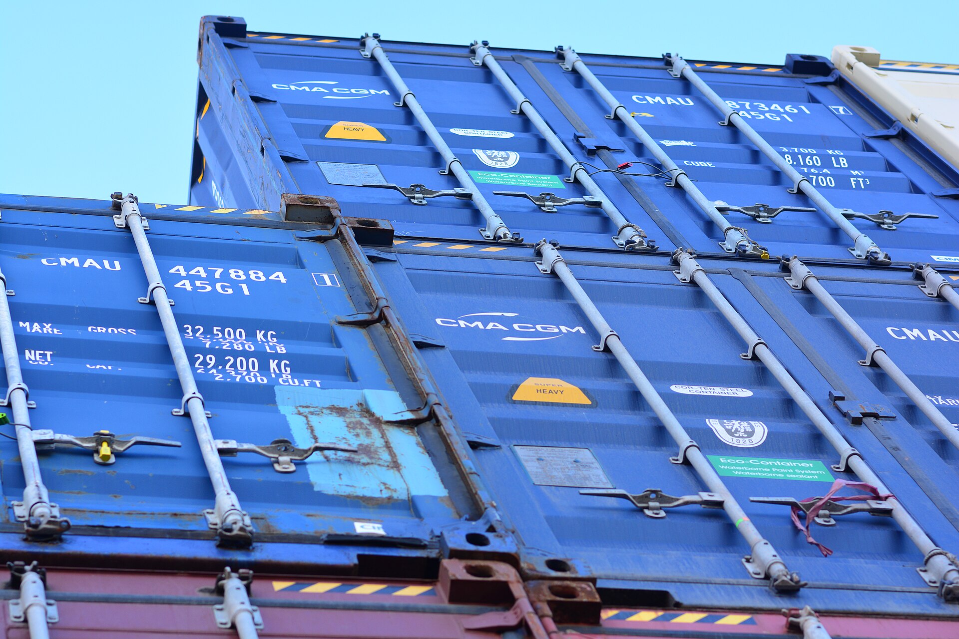 Stacks of export shipping containers at a port yard